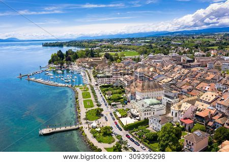 Aerial View Of Morges City Waterfront In The Border Of The Leman Lake In  Switzerland