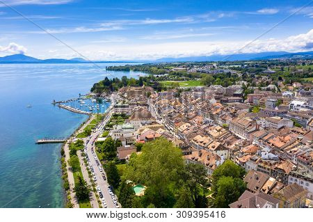 Aerial View Of Morges City Waterfront In The Border Of The Leman Lake In  Switzerland