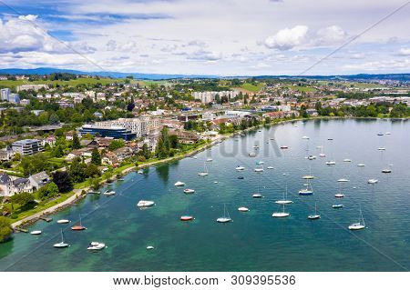 Aerial View Of Morges City Waterfront In The Border Of The Leman Lake In  Switzerland