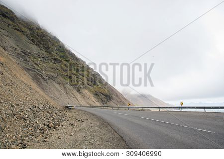 Road Through The Hvalnesskridur Land Slides In East Iceland On A Foggy Day