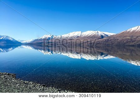 Stunning Mirror Reflections At The Deserted Lake Ohau