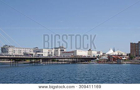 Southport, Merseyside, United Kingdom - 28 June 2019: The End Of The Suspension Bridge And Pier Cros