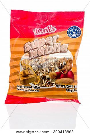 Winneconne, Wi - 12 June 2019 : A Package Of Montes Super Natilla Pecan Flavored Toffee On An Isolat