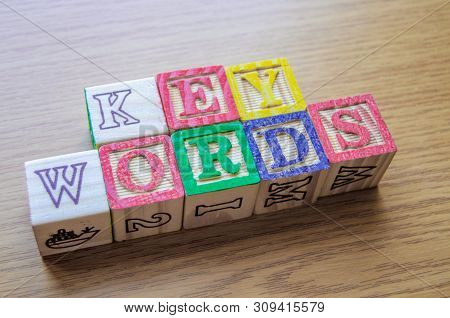 Educational Toy Cubes With Letters Organised To Display Word Keywords - Editing Metadata And Search 