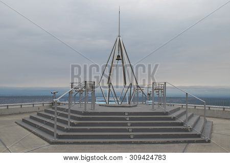 Lovers Sanctuary On Mount Moiwa. Couple Of Lovers Ring The Bell Together And The Happiness Will Foll
