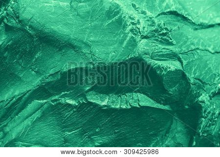 Vintage Green Background. Rough Painted Wall Of Emerald Color. Imperfect Plane Of Virid Colored. Une