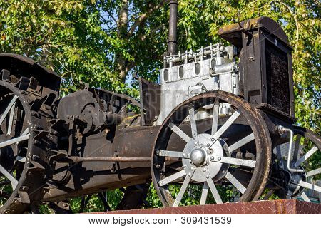 Vysokinichi, Russia - August 2018: Monument To The First Tractor Htz (kharkov Tractor Plant) In The 