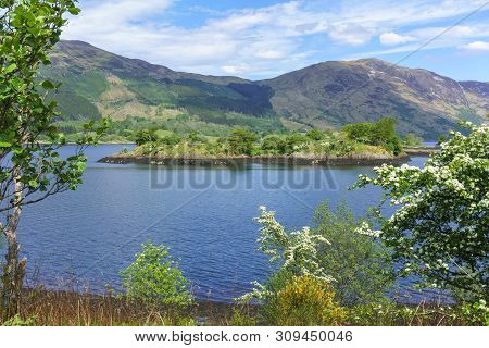 Eilean Munde Or The Burial Island Is A Small Island In Loch Leven In Summer , Glencoe , Scotland