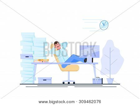 Business Man Is Resting At His Workplace Desk During Working Hours With The Piles Of Paper Document