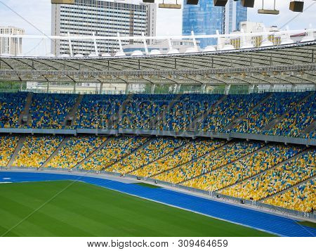 Kiev, Ukraine - 29 June 2019 Year. Football Stadium Nsk Olympiyskiy. Green Field. View Of The Stands
