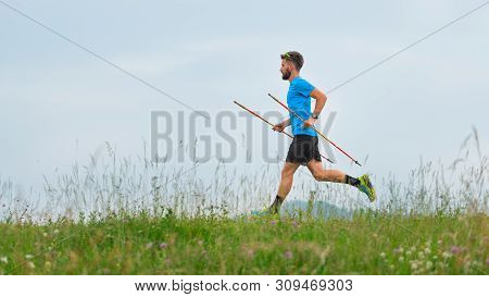 Mountain Runner During The Preparation Of A Long Distance Trail