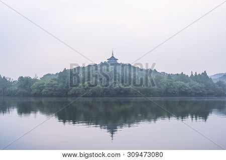 View Of Leifeng Pagoda At The West Lake In The Morning, Where Is A Freshwater Lake In Hangzhou, Zhej