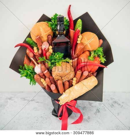 Meat And Chese Bouquet For Man. Eating Bouquet On Gray Background. Sausages, Vegetables, Cheese, Bre