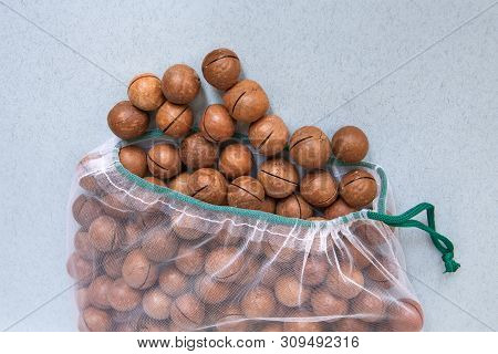 Nuts In Eco-friendly Packaging. Reusable Bags For Vegetables And Fruits. Shopping In The Store, Reta