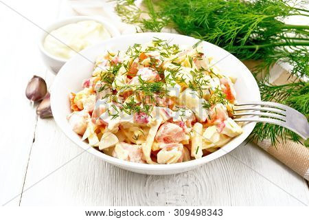 Salad Of Surimi And Eggs With Mayonnaise On Table