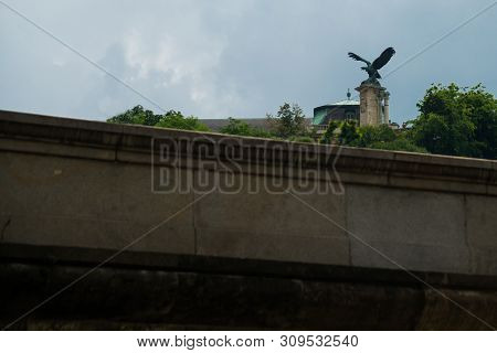 The Bronze Statue Of The Mythological Turul Bird At The Gate Of The Royal Palace In Budapest, Hungar