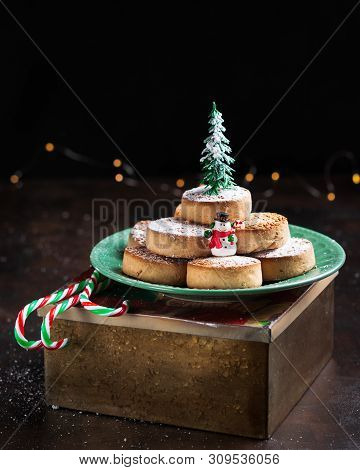 Typical Spansih Christmas Cookies Polvorones, Mantecados, With Almonds On Dark Wooden Background Wit