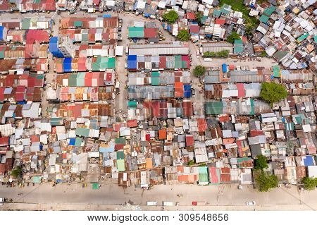 Streets Of Poor Areas In Manila. The Roofs Of Houses And The Life Of People In The Big City. Poor Di