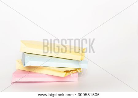 Colorfull Empty Paper Shopping Bag On Isolated Background.