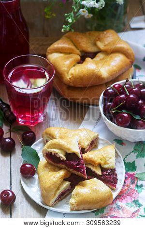 Traditional Homemade Romanian And Moldovan Pies - Placinta, Served With Wine. Rustic Style.