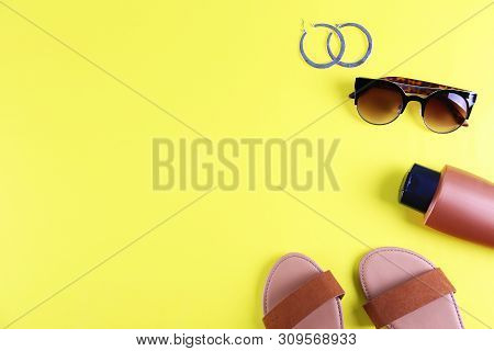 Casual Clothing Items Snd Accessories Or Summer Symbols, Beachwear On Colored Paper Textured Backgro