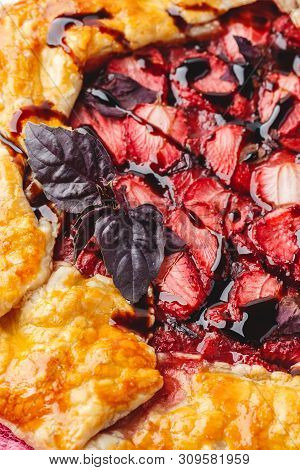 Homemade Strawberry Open Pie Gallet With Purple Basil And Balsamic Dressing On A Light Background. C