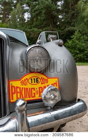 Wiecbork, Kujawsko Pomorskie / Poland - July 3, 2019: Rally Beijing - Paris. The Athlete Repairs The