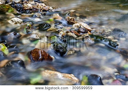 A Stony Streambed, A Stream Of Clear Water. Stream Repinka In The City Of Obninsk, Russia