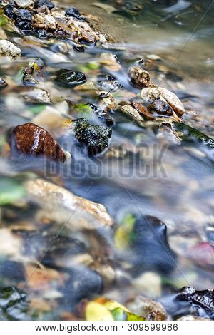 A Stony Streambed, A Stream Of Clear Water. Stream Repinka In The City Of Obninsk, Russia