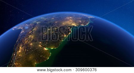 Planet Earth With Detailed Exaggerated Relief At Night Lit By The Lights Of Cities. South America. R