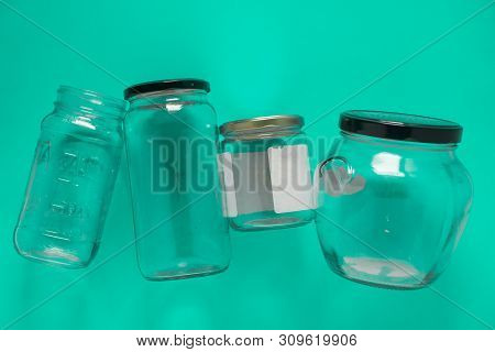 Isolated Glass Jars, Flat And Center On Mint Teal Green Background - Recycling