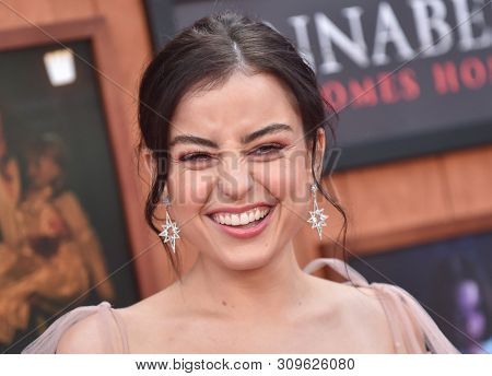 LOS ANGELES - JUN 20:  Katie Sarife arrives to the 'Annabelle Comes Home' World Premiere  on June 20, 2019 in Hollywood, CA