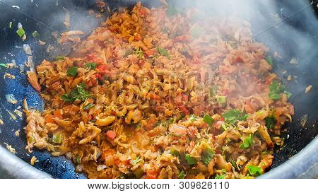 Catado De Siri: Brazilian Food Made Of Crab Meat In A Clay Pot With Smoke Coming Out.