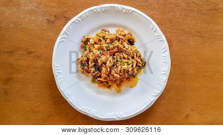 Catado De Siri: Brazilian Food Made Of Crab Meat In A White Plate On A Wooden Background