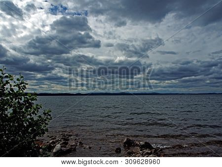 Heavy Gray Clouds Over The Lake On A Cloudy Evening, The Southern Urals, Lake Uvildy