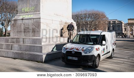 City Employee Who Cleans The Statue Of Louis Xiv In Montpellier, France