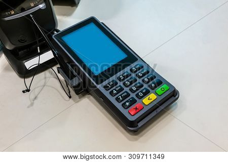 The Digital High Performance Pin Pad With Rich Multimedia And Commerce Capabilities On White Table