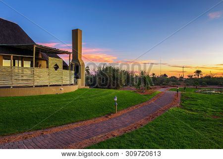 Mariental, Namibia - March 26, 2019 : Sunrise Above The Luxury Lapa Lange Game Lodge Located Near Th