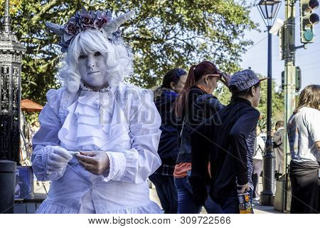 New Orleans, Usa - Dec 11, 2017: A Street Performer Dressed In White, With Face Painted White, Enter