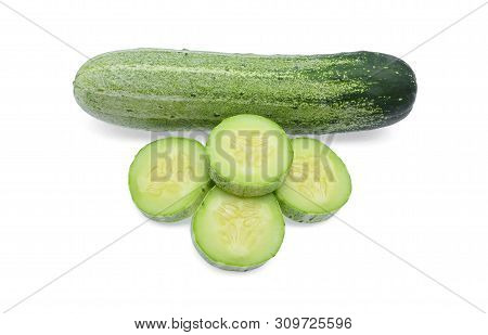 Whole And Sliced Of Cucumber Isolated On White Background