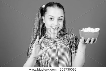 Delicious Marshmallow. Candy Shop. Small Girl Eat Delicious Marshmallow. Healthy Food And Dental Car