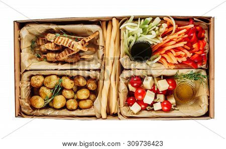 Delicious Health Meal Carton Box Isolated Delivery. Fried Potato And Grill Meat, Pepper, Carrot And 