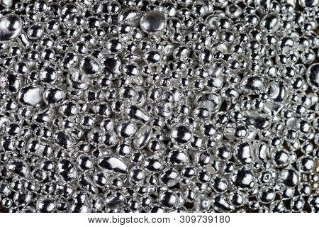 Pure Silver Granule Texture. Background From Silver Pellets.