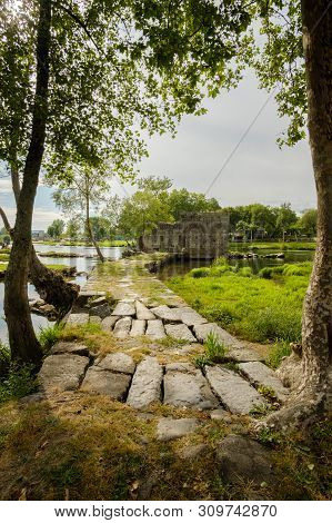 Amares, Portugal - June 20, 2019 : Ruins Of A Mill On The Green Banks Of The River Cávado In Braga, 