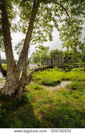 Amares, Portugal - June 20, 2019 : Ruins Of A Mill On The Green Banks Of The River Cávado In Braga, 