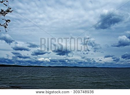 Heavy Gray Clouds Over The Lake On A Cloudy Evening, The Southern Urals, Lake Uvildy