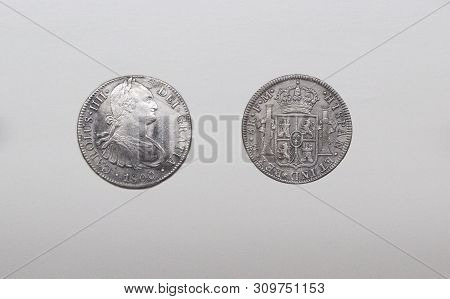 Cartagena, Spain - September 14th, 2018: Silver Spanish Pieces Of Eight Or Charles Iii, Minted In Me