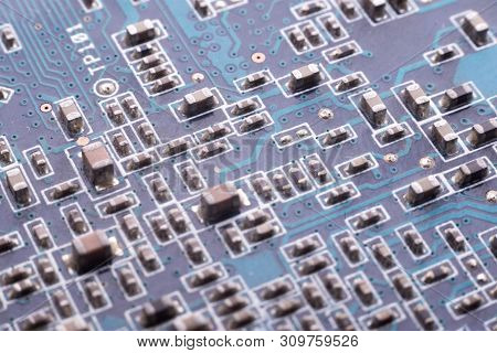 Chips And Capacitors On The Board Close-up