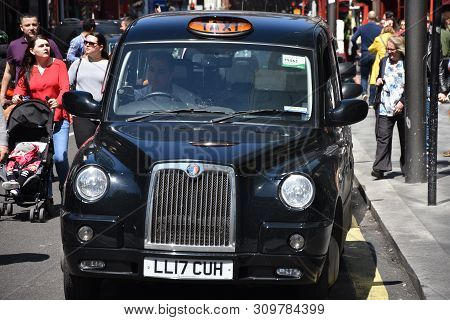 London: May 13, 2019 - London Taxi At Oxford Street W1 Westminster In Uk England