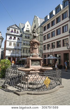 Frankfurt, Germany. July 2019.   The Friedrich-stoltze-brunnen Fountain In The Hühnermarkt Square In